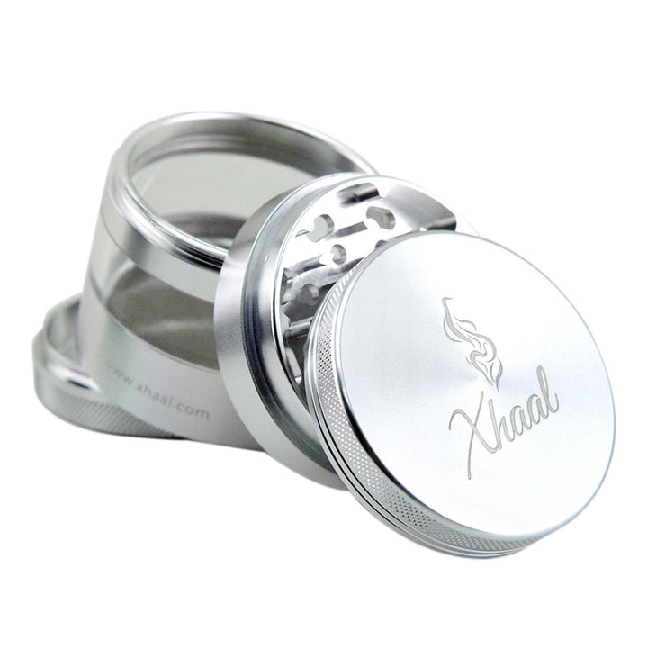 Sleek silver 4-Part Grinder featuring clear stash window and compact design