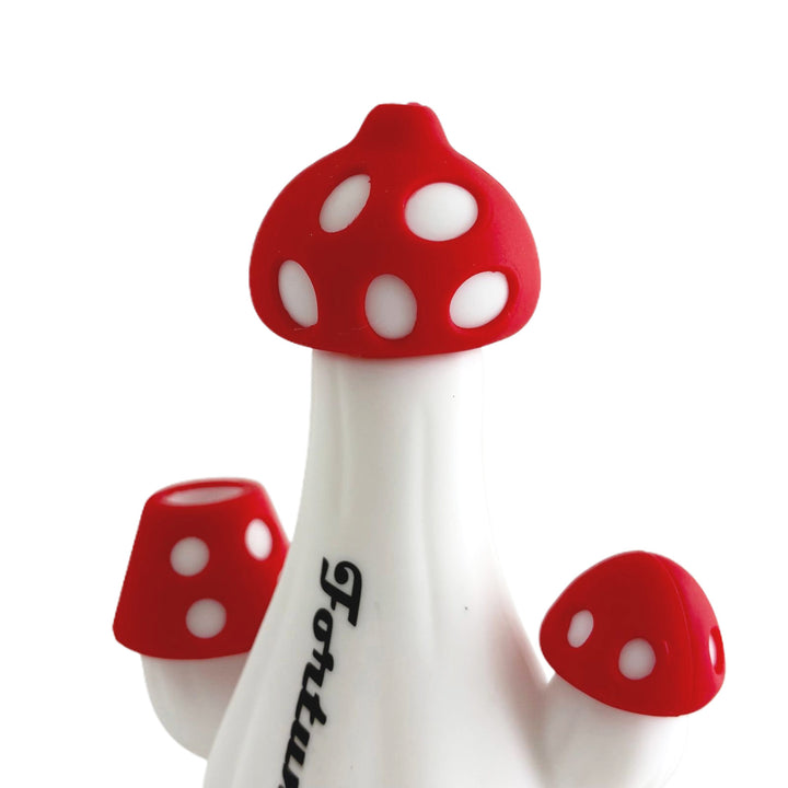 Close-up of red mushroom cap with white polka dots on Cute Mushroom Silicone Water Pipe