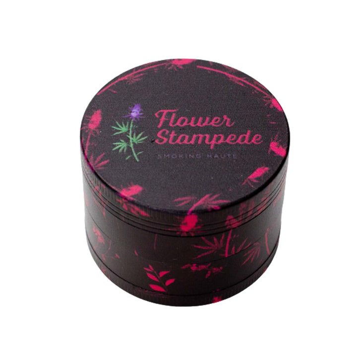 Top lid of Dark Floral 4-Piece Weed Grinder featuring signature pink floral design and magnetic closure