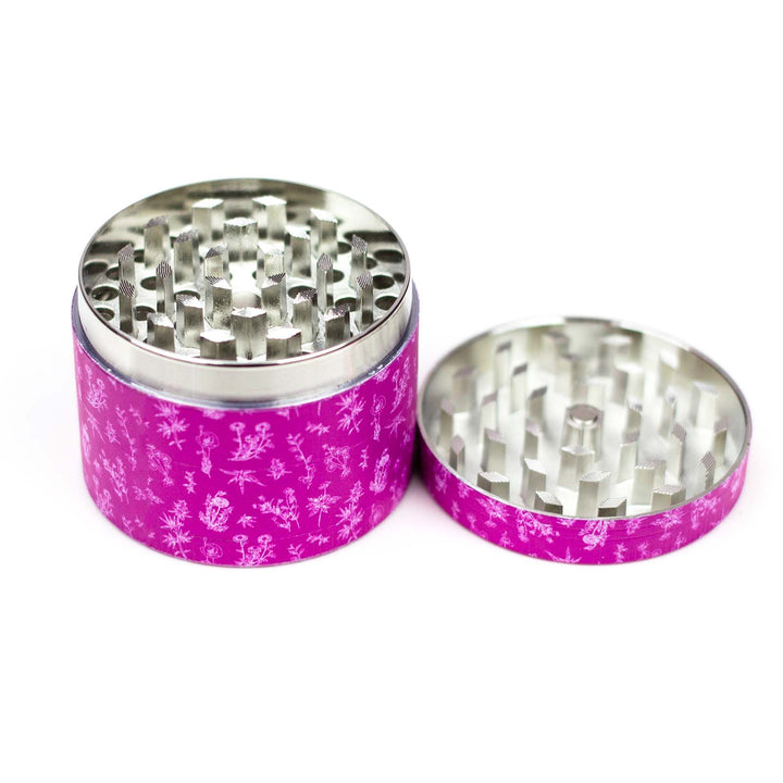 Grinding chamber of the Pink Herb Grinder with floral pattern design