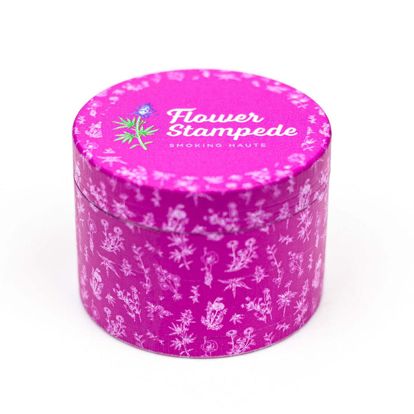 Flower Stampede Pink Herb Grinder with floral design and 4-piece aluminum body