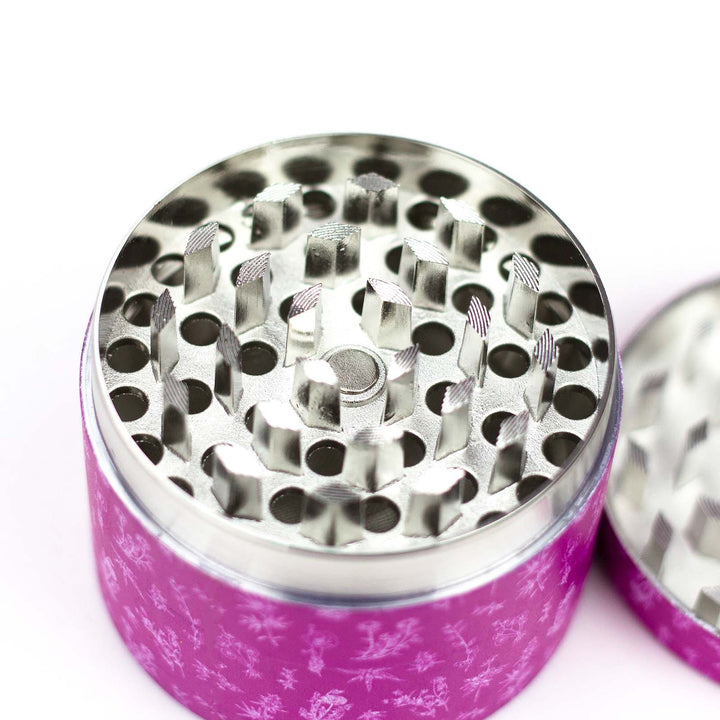 Close-up of diamond-shaped CNC teeth on the Pink Herb Grinder