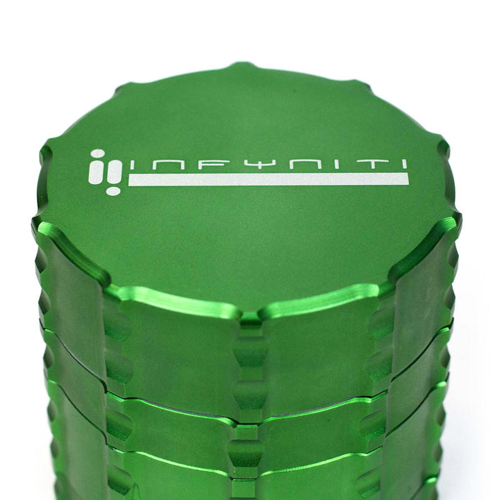 Top view of Infyniti 4-Part Zinc Drum Grinder showing logo on lid