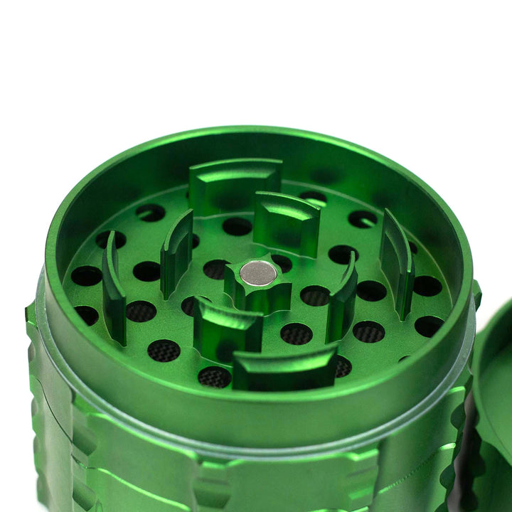 Close-up of sharp eclipse teeth inside Infyniti 4-Part Zinc Drum Grinder for precise herb grinding

