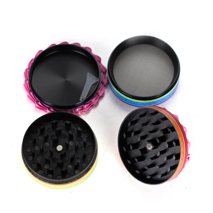 Peachy Rainbow Grinder disassembled into 4 pieces