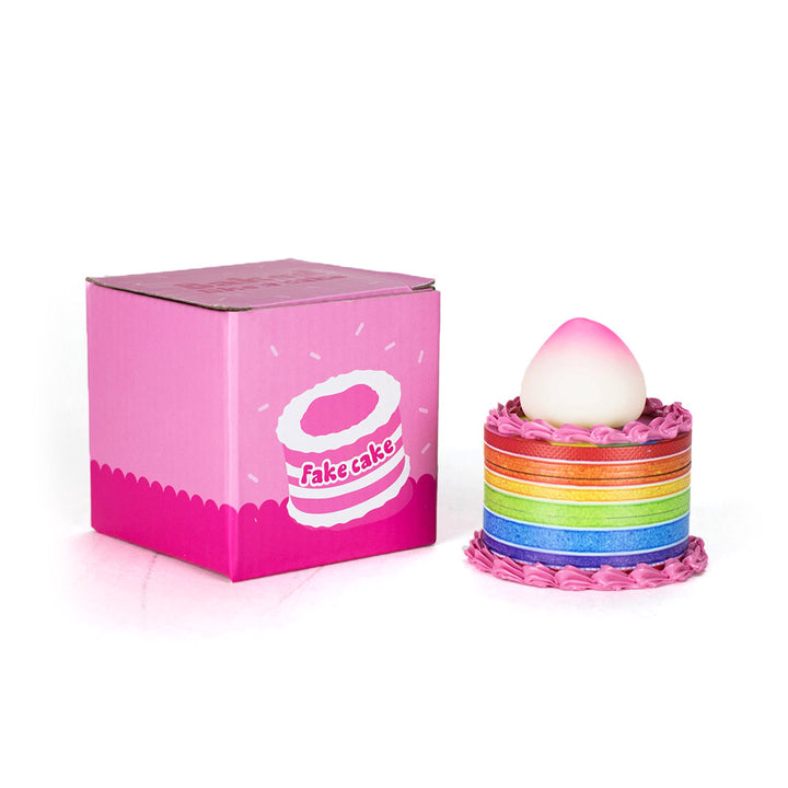 Retail packaging of the Peachy Rainbow Cake Weed Grinder
