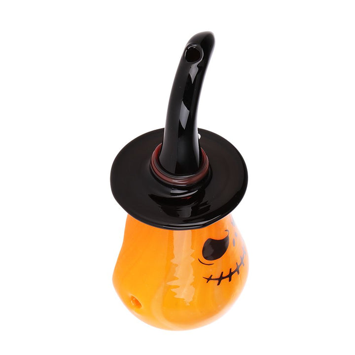 Side view of Pumpkin Witch Halloween Hand Pipe – festive glass pipe with pumpkin and witch hat design