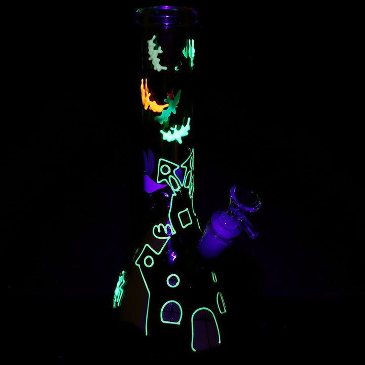 Glow-in-the-dark Spooky Haunted House Beaker Water Pipe illuminated in low light for spooky Halloween vibes