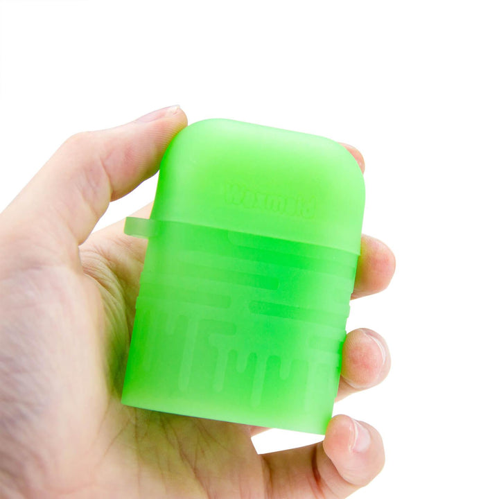 Silicone One Hitter Dugout held in hand showing portable size and easy carry