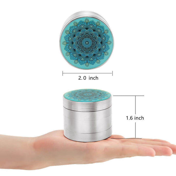 Mandala silver herb grinder held in hand for size reference PILOTDIARY