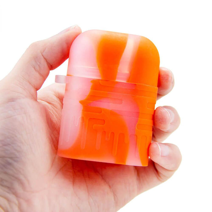 Orange Silicone One Hitter Dugout with Keychain Shown in Hand