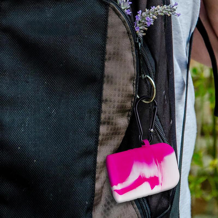 Pink Silicone Dugout One Hitter Set Clipped to Backpack with Carabiner