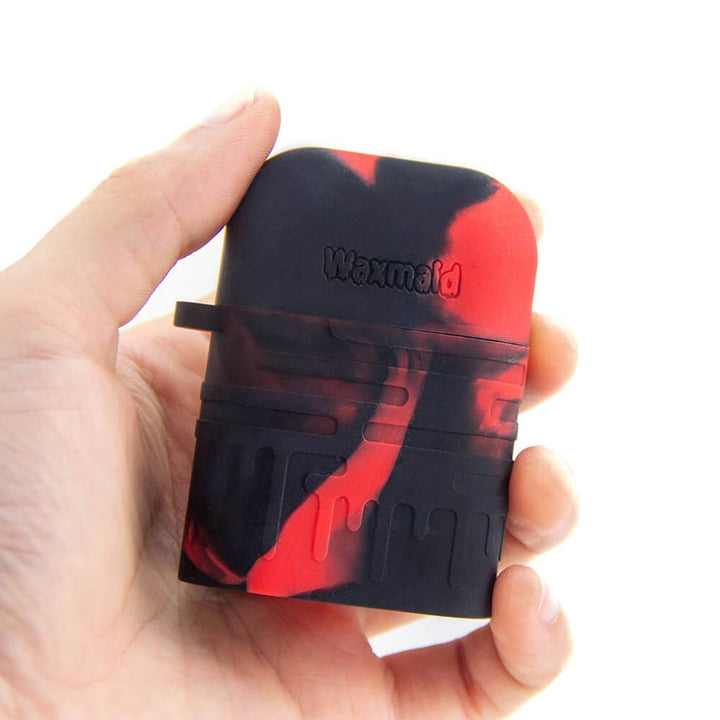 Portable Silicone Dugout with One Hitter Shown in Hand for Scale