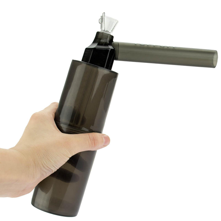 Black Portable Water Bottle Pipe held in hand for size reference